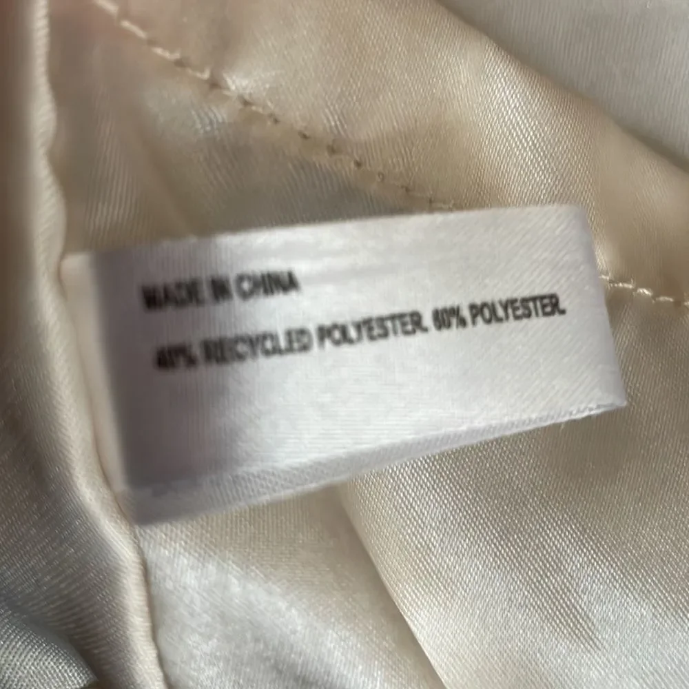 Pillowcase Polyester but Satin feel. From Target. 20”x 32”. Creme. Like new